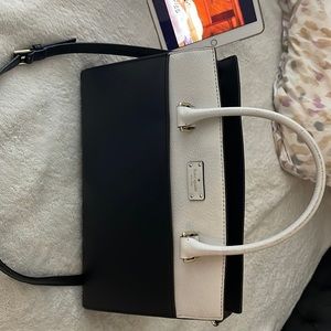 Kate spade purse. Black and white with cross body strap.